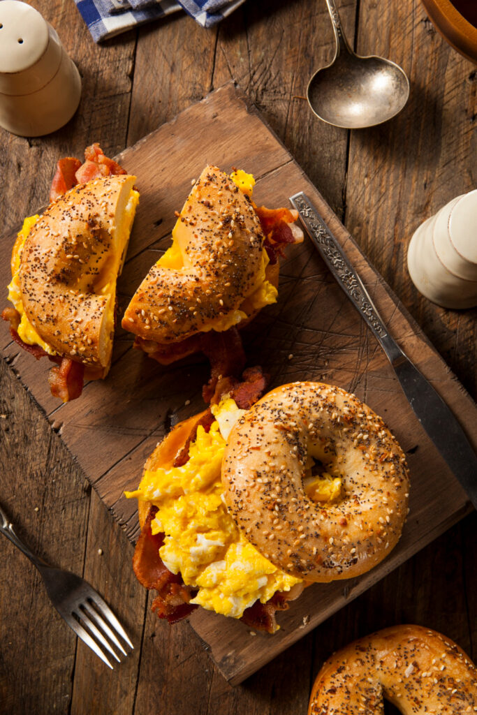 Steak, egg, and cheese bagel sandwich with melty cheese, tender steak, and a fried egg on a toasted sesame bagel.