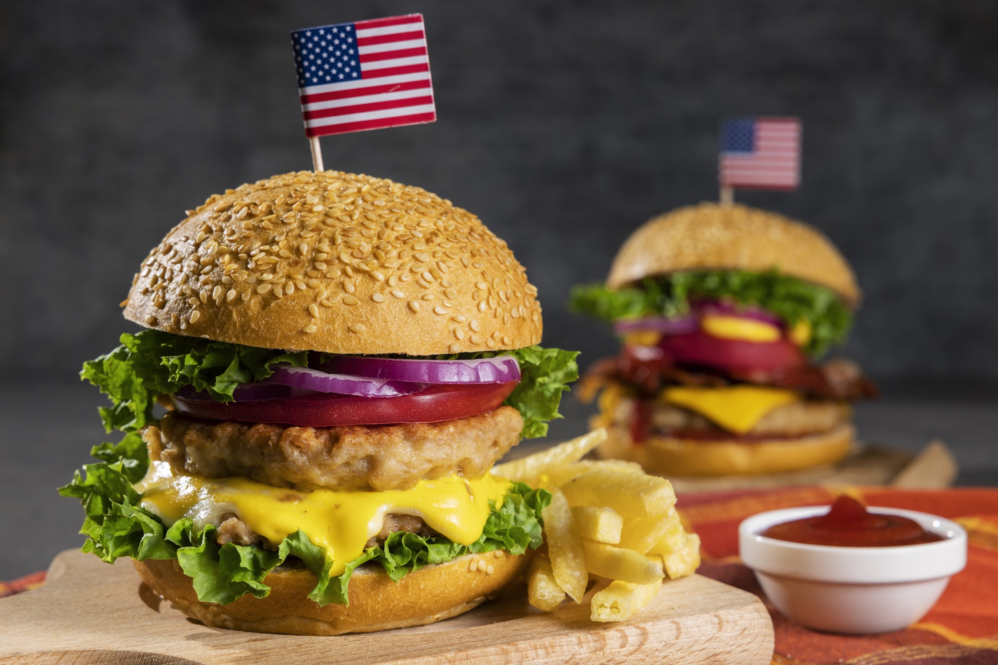 Big Mac sloppy joes served on sesame seed buns with melted cheese, diced pickles, and a side of crispy fries.